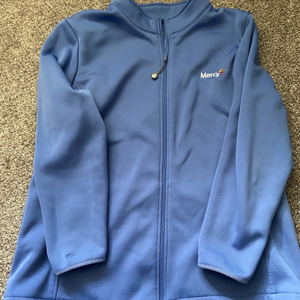 Light blue mercy scrub jacket